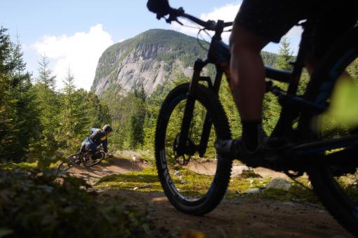 Cyclists on mountain bike trails in the Vallée Bras-du-Nord.